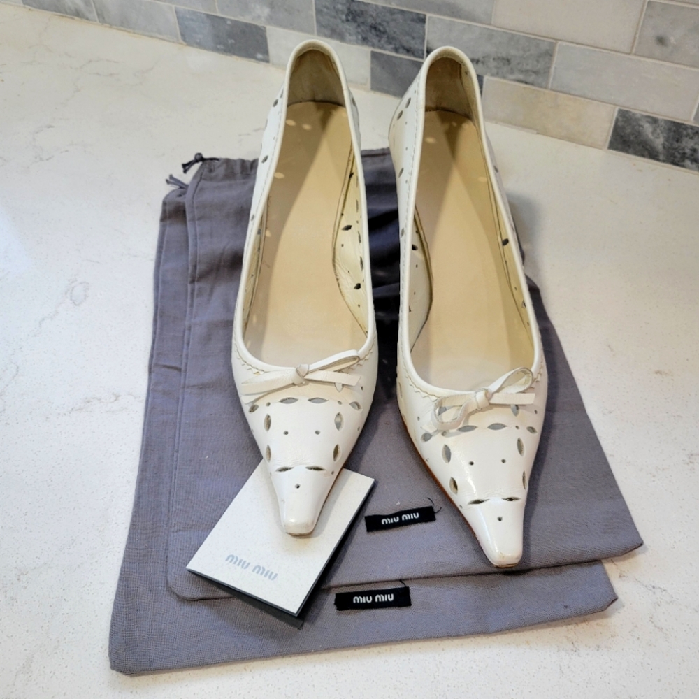 MIU MIU leather resoled and refined pumps.  From smoke free home